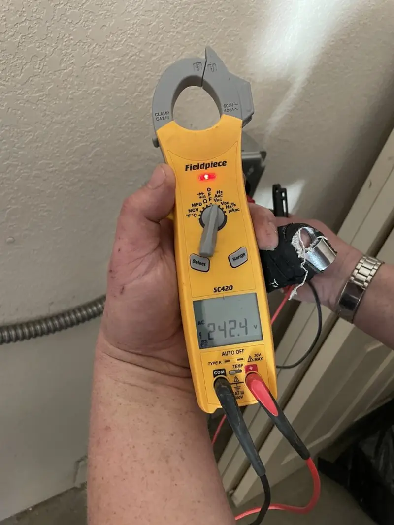 Voltage testing with clamp meter during Whole House Surge Protector in Lewisburg